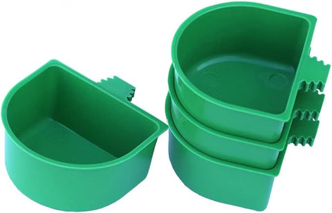 Set of green plastic containers on a white background