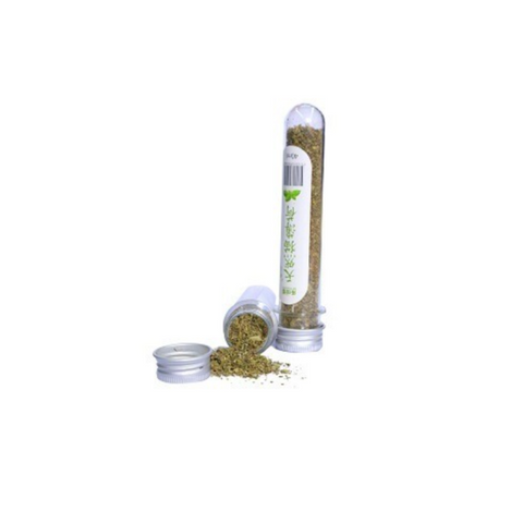 Spice container with open lid showing dried herbs on a white background