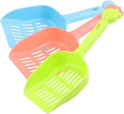 Three colorful plastic shovels on a white background