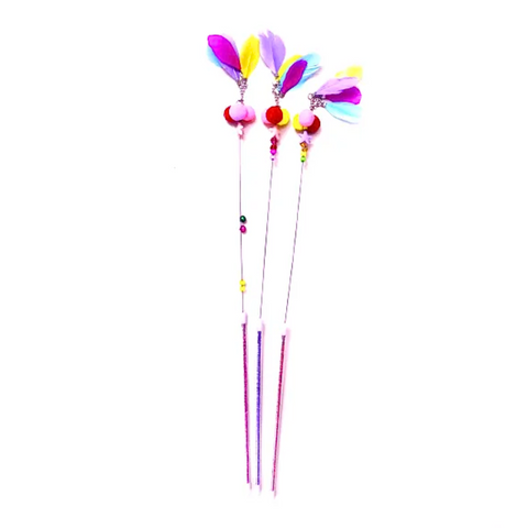 Colorful feather hair sticks on a white background