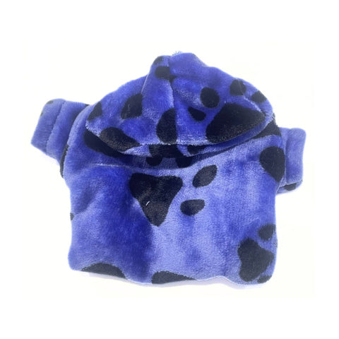 Blue plush toy with black paw prints on a white background
