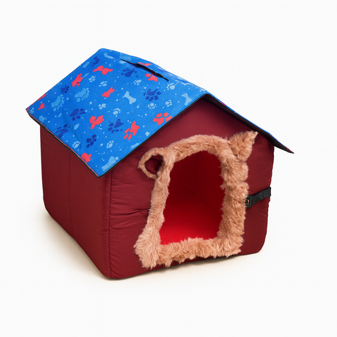 Red pet house with blue roof featuring paw prints on a white background