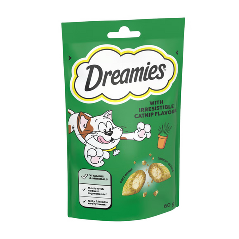 Green package of Dreamies cat treats with a cartoon cat on a white background