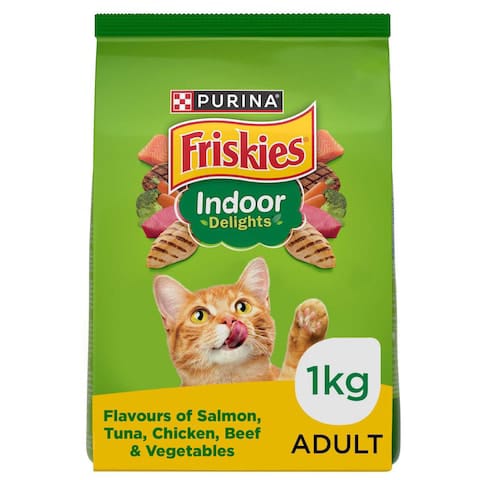 Green bag of Purina Friskies Indoor Delights cat food with a cat on the label.