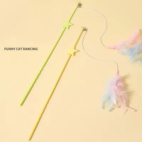 Cat toy with a wand and feather on a yellow background, labeled 'Funny Cat Dancing'.