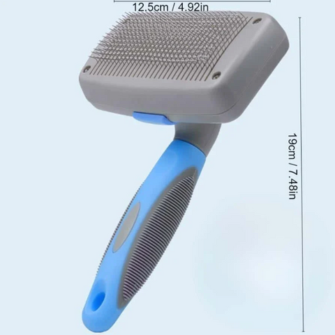 Pet grooming brush with measurements on a light blue background