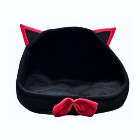 Black pet bed with red accents shaped like a cat's face on a white background