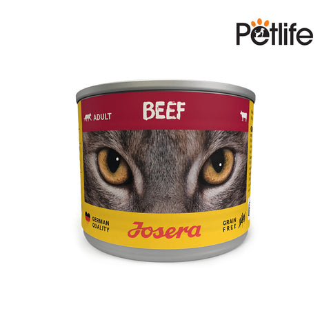 Josera beef canned pet food with a wolf's eye on the label against a white background