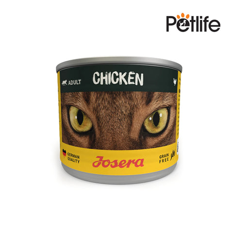 Can of Josera cat food with a cat's eye on the label against a white background