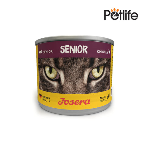 Can of Josera Senior cat food with a cat's face on the label against a white background