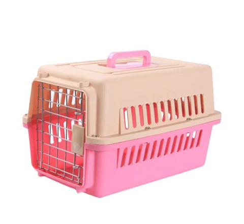 Pink and beige pet carrier with a handle on a white background