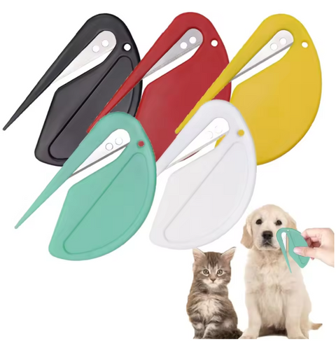 Set of pet grooming tools in various colors with a hand holding one, accompanied by a cat and a dog on a white background.