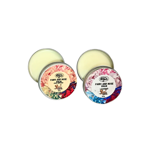 Two tins of 'Peach & Rose Balm' with colorful labels on a white background