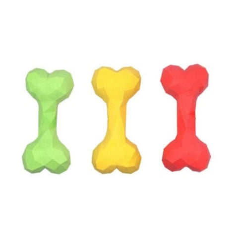Three bone-shaped toys in green, yellow, and red on a white background