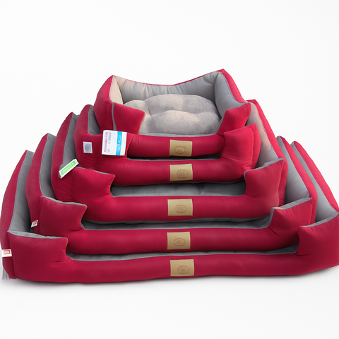 Set of red pet beds with gray interiors on a white background
