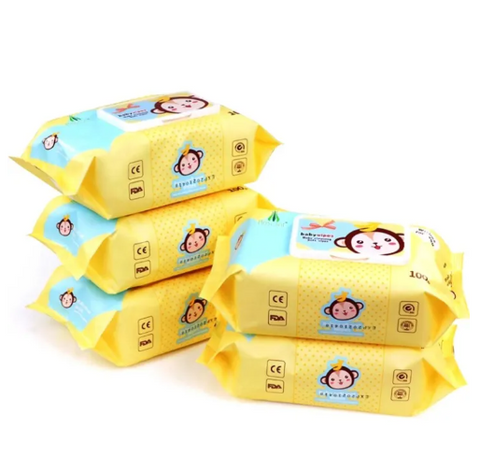Stack of yellow baby wipes with cartoon character on a white background