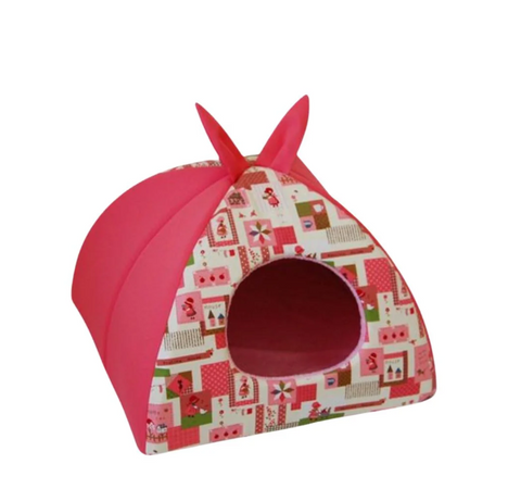 Pink pet bed with a patterned design on a white background