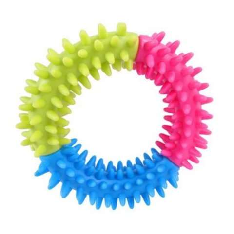 Colorful spiky ring toy on a white background
