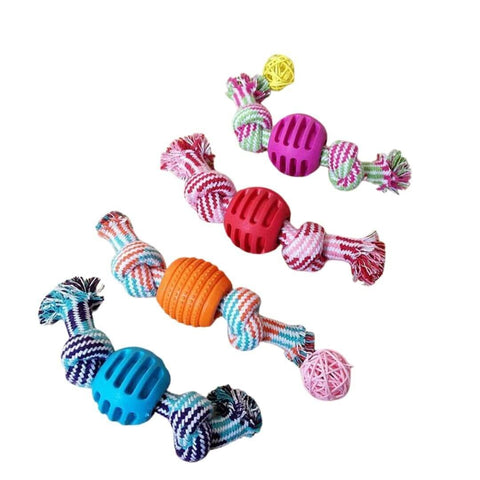 Colorful dog toys including balls and bones on a white background