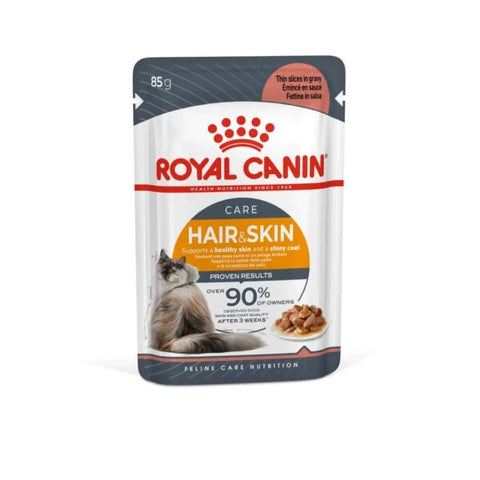Royal Canin hair and skin care cat food pouch on a white background