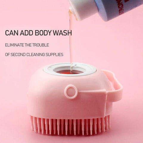 Pink silicone scrubber with body wash being poured onto it against a pink background