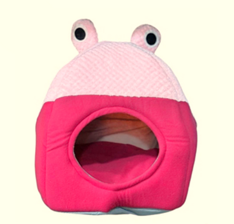 Pink pet house shaped like a crab on a white background