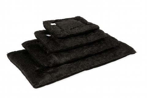Set of black towels on a white background