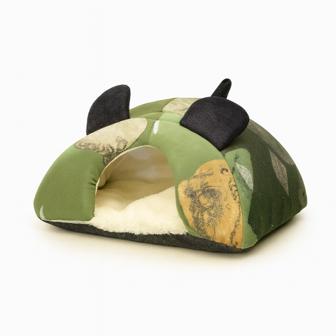 Green pet bed with black ears on a white background