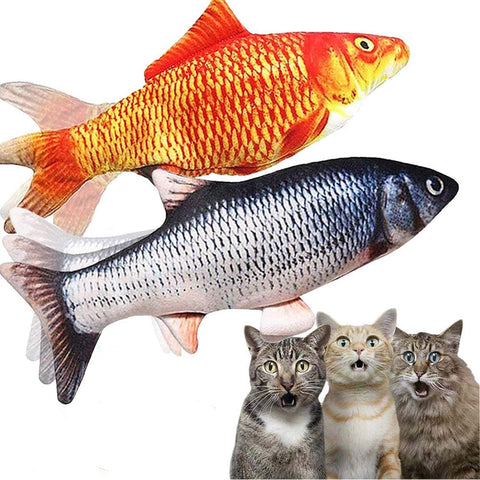 Two toy fish, one gold and one silver, with three cats looking at them.